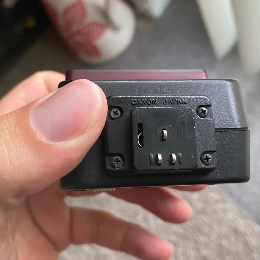 Canon Speedlite model 244T hot shoe flash for Canon Cameras.